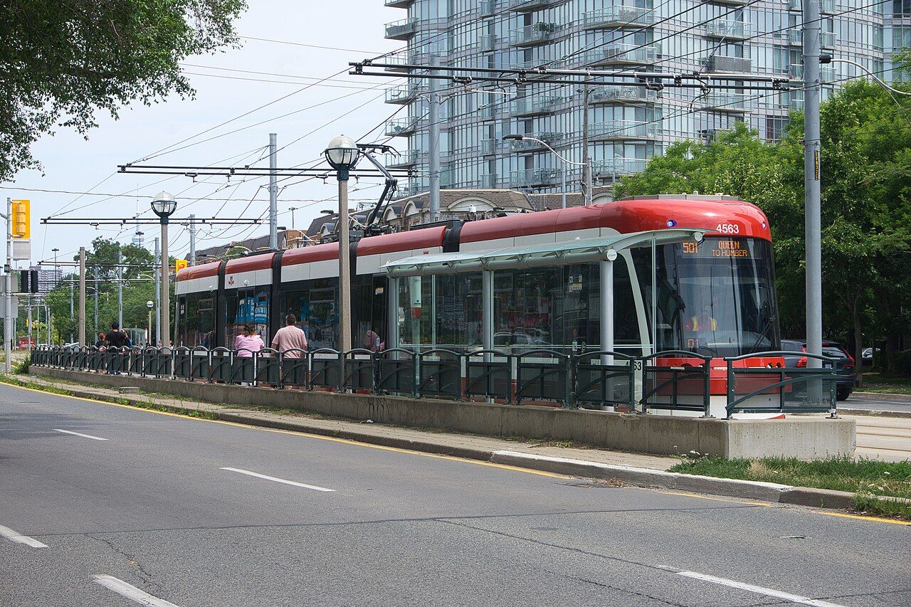 A red TTC streetcar on route 501 in Toronto
